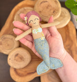 Mini mermaid doll